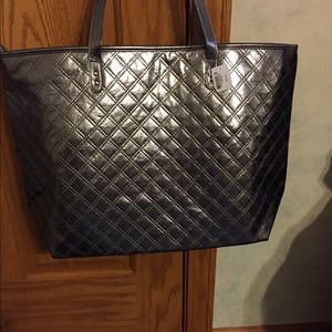 Silver tote/purse. New with tags.